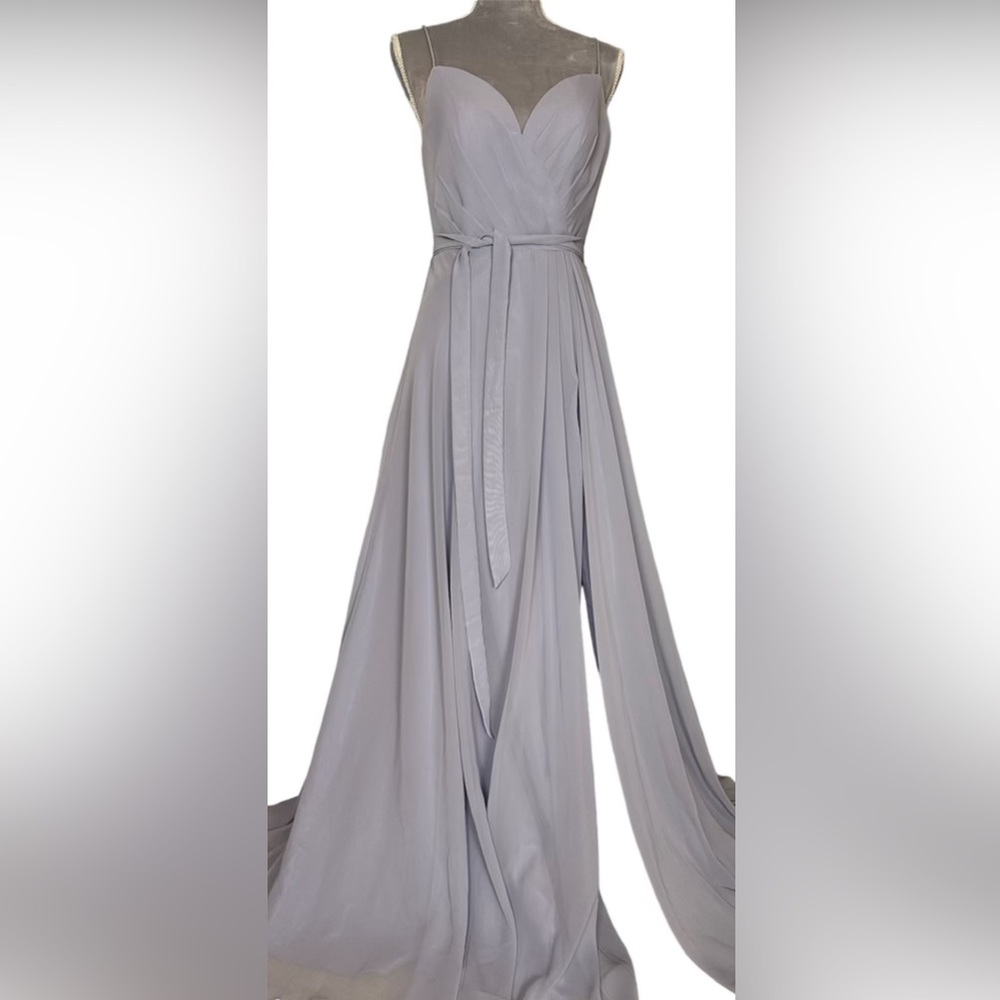 Kleinfeld’s lavender sweetheart long gown with side slit spaghetti strap. Size 4